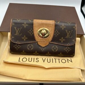 Louis Vuitton Monogram Bowtie wallet.